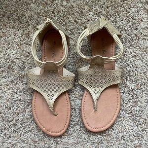 Brand new gold sandal, size 9